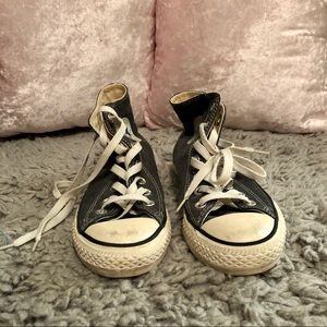 Gray high-top Converse Allstar